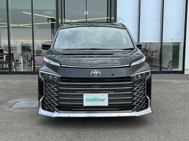 トヨタ ヴォクシー S－G 愛媛県 2023(令5)年 2万km アティチュードブラックマイカ 純正ディスプレイオーディオ/両側パワースライドドア/ETC2.0/クルーズコントロール/コーナーセンサー前後/オートハイビーム/オートライト/LED/レーンキープアシスト/バックカメラ/ウォークスルー/純正16AW/Bluetooth/スマートキー