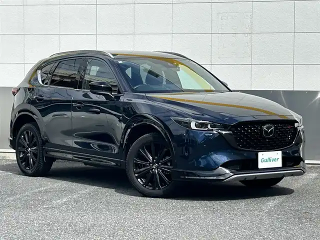マツダ ＣＸ－５ 25S スポーツアピアランス 東京都 2022(令4)年 0.7万km ディープクリスタルブルーマイカ ワンオーナー/純正10.25インチSDナビ/　フルセグTV/DVD/CD/Bluetooth/360°ビューモニター/アドバンストスマートシティブレーキサポート/後退時スマートシティブレーキサポート/誤発進抑制/スマートブレーキサポート/レーダークルーズコントロール/クルージングトラフィックサポート/ブラインドスポットモニタリング/車線逸脱警報システム/レーンキープアシスト/パーキングセンサー/ヘッドアップディスプレイ/アダプティブLEDヘッドライト/オートライト/ハンズフリーパワーバックドア/純正19インチアルミホイール/レザーシート/パワーシート/シートヒーター/シートメモリー/革巻きステアリングホイール/パドルシフト/ステアリングヒーター/ステアリングスイッチ/ワイヤレス充電/ドライブレコーダー/プッシュスタート/スマートキー/電動オート格納ミラー/ヒーターミラー/ウインカーミラー/LEDバニティミラー/LEDルームランプ/LEDフットランプ/フロアマット/保証書/取扱説明書/スペアキー