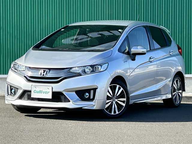 ホンダ フィット ハイブリット Sパッケージ 神奈川県 2013(平25)年 7.3万km アラバスターシルバーメタリック ワンオーナー/無限フロントスポイラー/無限スポーツマフラー/無限フロアマット/無限スカッフプレート/無限カーボンシフトノブ/Hondaインターナビ/・CD/DVD/・Bluetooth/・HDMI接続/・フルセグテレビ/バックカメラ/ETC/ドライブレコーダー/クルーズコントロール/パドルシフト/LEDヘッドライト/LEDフォグランプ/ヒルスタートアシスト/スマートキー＆プッシュスタート/純正16インチAW/Wエアバッグ