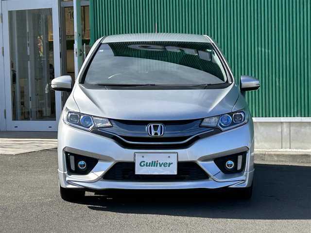 ホンダ フィット ハイブリット Sパッケージ 神奈川県 2013(平25)年 7.3万km アラバスターシルバーメタリック ワンオーナー/無限フロントスポイラー/無限スポーツマフラー/無限フロアマット/無限スカッフプレート/無限カーボンシフトノブ/Hondaインターナビ/・CD/DVD/・Bluetooth/・HDMI接続/・フルセグテレビ/バックカメラ/ETC/ドライブレコーダー/クルーズコントロール/パドルシフト/LEDヘッドライト/LEDフォグランプ/ヒルスタートアシスト/スマートキー＆プッシュスタート/純正16インチAW/Wエアバッグ