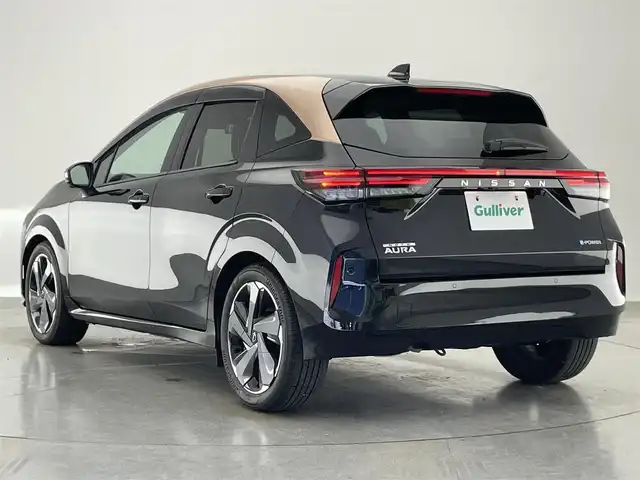 日産 オーラ G レザーエディション 愛知県 2022(令4)年 1.9万km ミッドナイトブラック/サンライズカッパー ＮｉｓｓａｎＣｏｎｎｅｃｔ９型ナビ　ＢＯＳＥ　デジイン　全方位カメラ　ＢＳＭ　黒革　プロパイロット　ＨＤＭＩ　禁煙車　フルセグ　ＥＴＣ２．０　ドラレコ　ＬＥＤライト　コーナーセンサー　ワイヤレス充電　フォグランプ　オートハイビーム　電子パーキング　USB　Bluetooth　衝突軽減　車線逸脱　純正フロアマット　プッシュスタート　スマートキー