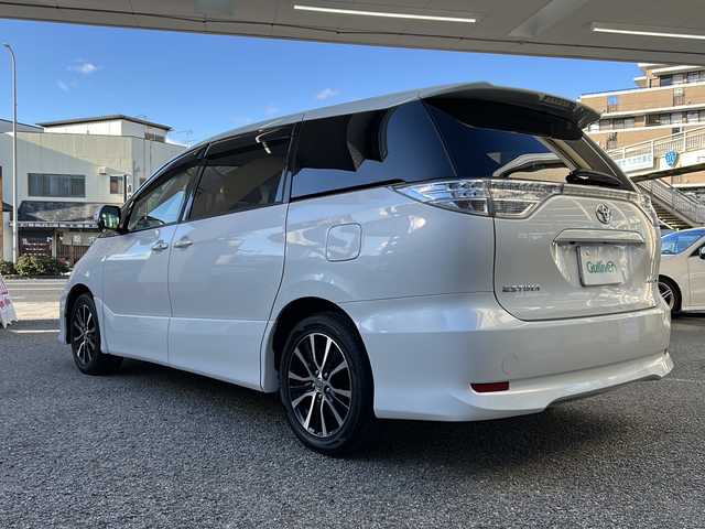 トヨタ エスティマ アエラス サイドリフトアップ 兵庫県 2016(平28)年 8.3万km ホワイトパールクリスタルシャイン 福祉車両/純正SDナビ/Bluetooth・AM/FM・CD・DVD/フルセグTV/バックカメラ/ビルトインETC/両側パワースライドドア/2列目左側サイドリフトシート/クルーズコントロール/アンチロック・ブレーキ・システム/横滑り防止装置/純正フロアマット/革巻きステアリング/LEDヘッドライト/プッシュスタート/スマートキー