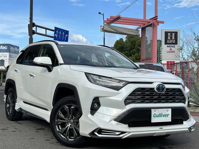 トヨタ ＲＡＶ４ ハイブリットG 香川県 2022(令4)年 4.8万km ホワイトパールクリスタルシャイン ワンオーナー/純正ディスプレイオーディオナビ/【フルセグ/Bluetooth】/パノミラックビューモニター/モデリスタフルエアロ/レザーシート/シートヒーター/シートベンチレーション/トヨタセーフティセンス/レーダークルーズコントロール/電動リアゲート/LEDヘッドライト/プリクラッシュセーフティ/レーンキープアシスト/オートマチックハイビーム/クリアランスソナー/ハンドルヒーター/純正ビルトインETC/純正18インチアルミ