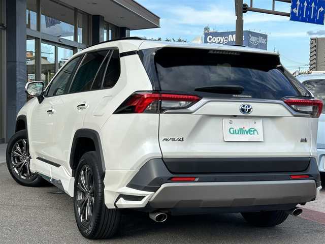 トヨタ ＲＡＶ４ ハイブリットG 香川県 2022(令4)年 4.8万km ホワイトパールクリスタルシャイン ワンオーナー/純正ディスプレイオーディオナビ/【フルセグ/Bluetooth】/パノミラックビューモニター/モデリスタフルエアロ/レザーシート/シートヒーター/シートベンチレーション/トヨタセーフティセンス/レーダークルーズコントロール/電動リアゲート/LEDヘッドライト/プリクラッシュセーフティ/レーンキープアシスト/オートマチックハイビーム/クリアランスソナー/ハンドルヒーター/純正ビルトインETC/純正18インチアルミ