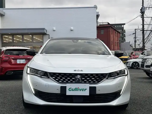 プジョー ５０８ SW GT ブルーHDi 熊本県 2020(令2)年 6.3万km BLANC NACRE サンルーフ/FOCALスピーカー/純正ナビ付ディスプレイオーディオ/【フルセグTV/Bluetooth/AM/FM】/全周囲カメラ/バックカメラ/衝突軽減防止装置/レーンキープアシスト/ブラインドスポットモニター/コーナーセンサー/パドルシフト/パワーバックドア/革巻きステアリング/ステアリングスイッチ/レザーシート/前席パワーシート/純正18インチAW/プッシュスタート/スマートキー/盗難防止装置/取扱説明書