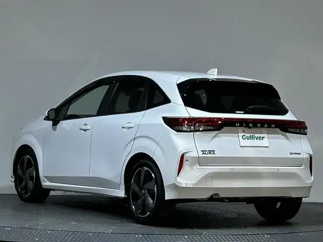 日産 オーラ G 愛媛県 2024(令6)年 0.3万km ピュアホワイトパール ・９型ナビ（フルセグＴＶ・ＢＴ・ＦＭＡＭ）/・全方位カメラ　/・デジタルインナーミラー　/・オートマチックハイビーム　/・ステアリングリモコン　/・ＬＥＤヘッドライト