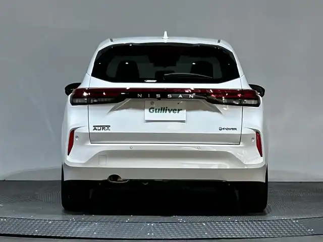 日産 オーラ G 愛媛県 2024(令6)年 0.3万km ピュアホワイトパール ・９型ナビ（フルセグＴＶ・ＢＴ・ＦＭＡＭ）/・全方位カメラ　/・デジタルインナーミラー　/・オートマチックハイビーム　/・ステアリングリモコン　/・ＬＥＤヘッドライト