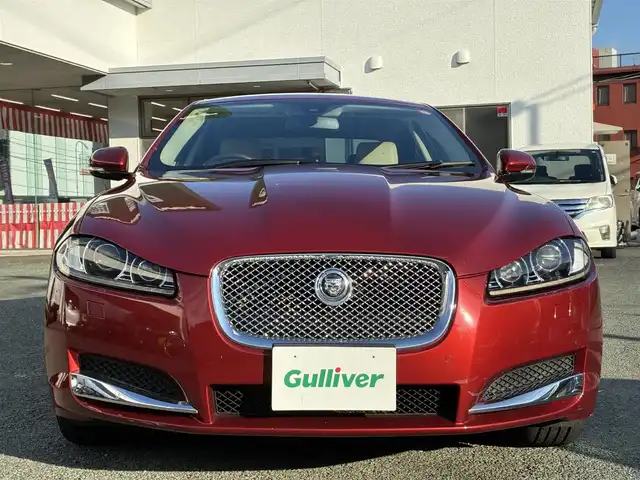 ジャガー ＸＦ 3．0 プレミアム ラグジュアリー 熊本県 2012(平24)年 3.6万km イタリアンレーシングレッド 純正メーカーナビ/【フルセグTV/CD/DVD】/バックカメラ/クルーズコントロール/コーナーセンサー/純正19インチAW/レザーシート/前席パワーシート/ウィンカーミラー/オートLEDヘッドライト/プッシュスタート/スマートキー/純正フロアマット/横滑り防止装置/盗難防止装置/ABS/取扱説明書/スペアキー
