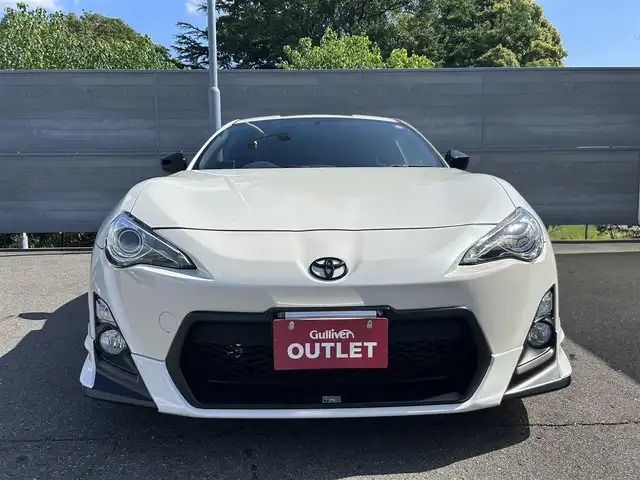 トヨタ ８６ GT 三重県 2014(平26)年 2.8万km クリスタルホワイトパール ワンオーナー/禁煙車/TRDフロントスポイラー/TRDサイドスカート/TRDリアバンパースポイラー/SARD LSRリアウイング/RAYS19インチアルミホイール/TEINダウンサス/柿本改マフラー/MOMOステアリング/ユピテルスーパーキャットレーダー探知機/社外メモリナビ/バックカメラ/ETC