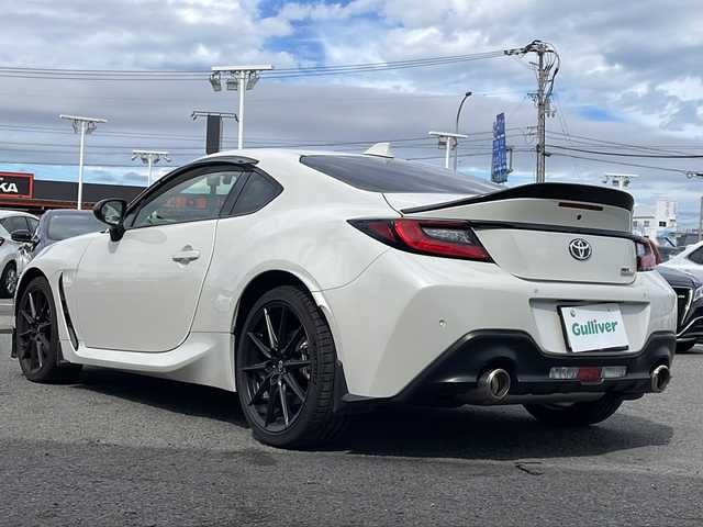 トヨタ ＧＲ８６ RZ 徳島県 2023(令5)年 1万km クリスタルホワイトパール GRエアロ/・フロントスポイラー/・GRトランクスポイラー/・GRエアロスタビライジングカバー/純正9インチナビ/バックカメラ/シートヒーター/レーダークルーズコントロール/レーンディパーチャーアラート〔LDA〕/ステアリング連動ヘッドランプ〔SRH〕/クリアランスソナー/LEDヘッドライト/オートライト/ドライブレコーダー/純正18AW/純正フロアマット/スペアキー/取扱説明書（車・ナビ）/保証書