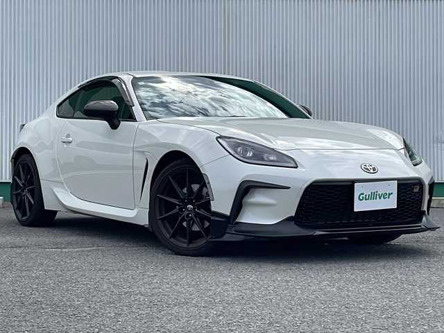 トヨタ ＧＲ８６ RZ 徳島県 2023(令5)年 1万km クリスタルホワイトパール GRエアロ/・フロントスポイラー/・GRトランクスポイラー/・GRエアロスタビライジングカバー/純正9インチナビ/バックカメラ/シートヒーター/レーダークルーズコントロール/レーンディパーチャーアラート〔LDA〕/ステアリング連動ヘッドランプ〔SRH〕/クリアランスソナー/LEDヘッドライト/オートライト/ドライブレコーダー/純正18AW/純正フロアマット/スペアキー/取扱説明書（車・ナビ）/保証書