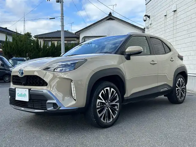 トヨタ ヤリスクロス ハイブリッド Z アドベンチャー 山形県 2023(令5)年 2万km ベージュ 純正ディスプレイオーディオ/・AM/FM/Miracast/Bluetooth/4WD/禁煙車/寒冷地仕様/プリクラッシュセーフティ/全周囲カメラ/レーンキープアシスト/追従式クルーズコントロール/オートホールド/電動パーキングブレーキ/ダウンヒルアシストコントロール/オートライト/オートハイビーム/前席ヒートシーター/D席パワーシート/ETC/横滑り防止装置/ステアリングヒーター/スマートキー