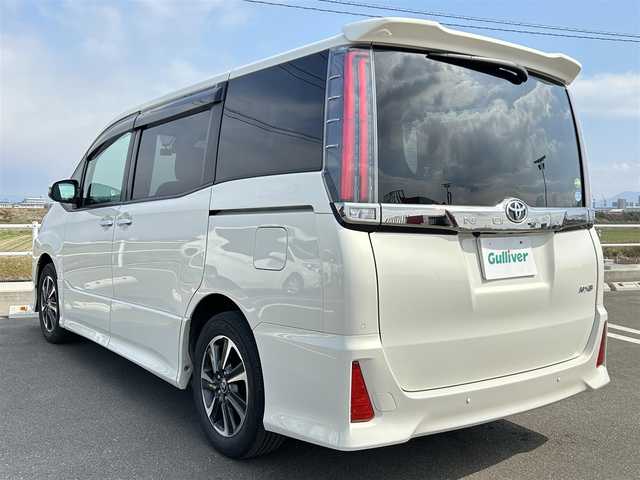 トヨタ ノア Si ダブルバイビーⅡ 佐賀県 2019(令1)年 4.3万km ラグジュアリーホワイトパールクリスタルシャインガラスフレーク 純正9型ナビゲーション/・フルセグTV/CD/DVD/Bluetooth/バックカメラ/純正12.1型フリップダウンモニター【V12T-R68C】/純正ドライブレコーダー【TZ-D102】/両側パワースライドドア/トヨタセーフティーセンス/・プリクラッシュセーフティ/・レーンディパーチャーアラート/クリアランスソナー/クルーズコントロール/USB充電ポート/ビルトインETC/革巻きステアリング/ステアリングリモコン/ハーフレザーシート/純正16インチアルミホイール/後席サンシェード/プッシュスタート/スマートキー/フロアマット/ドアバイザー/スペアキー１本