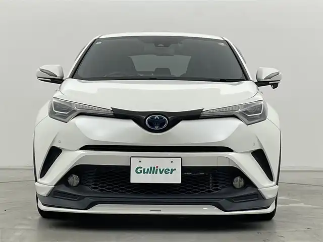 トヨタ Ｃ－ＨＲ G LEDエディション 群馬県 2018(平30)年 6.6万km ホワイトパールクリスタルシャイン TRDエアロパーツ/ ・フロントスポイラー/サイドスカート/リヤバンパースポイラー/モデリスタセレクションエクステリアパーツ/ ・LEDミラーカバー/ ・LEDトップノットアンテナ/ ・LEDライセンスランプ/純正リアスポイラー/バックカメラ/＝＝＝＝＝/純正7インチナビ/(AM/FM/Bluetooth/フルセグTV/CD/DVD/SD)/ブラインドスポットモニター/クリアランス/バックソナー/Toyota Safety Sense/ ・プリクラッシュセーフティシステム/ ・レーンディパーチャーアラート/ ・オートマチックハイビーム/ ・レーダークルーズコントロール/前席シートヒーター/ビルトインETC/電動パーキングブレーキ/オートブレーキホールド/プッシュスタート/スマートキー