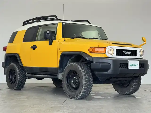 トヨタ ＦＪクルーザー オフロードパッケージ 愛知県 2012(平24)年 12.4万km イエロー/ホワイト ４ＷＤ　/サイドステップ/ルーフラック/クルーズコントロール　/フォグ　/リアデフロック　/クロールコントロール　/ナビＮＨＢＡ－Ｗ６２Ｇ　/バックカメラ　/ＥＴＣ　/ステアスイッチ　/ＵＳＢ　/リモコンキー　/フルセグＴＶ　/サイド、カーテンエアバック　/背面タイヤ
