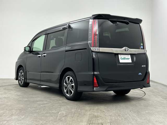 トヨタ ノア Si ダブルバイビーⅡ 三重県 2019(令1)年 2.4万km ブラック 禁煙車/純正SDナビ/CD/DVD/SD/BT/フルセグTV/バックカメラ/両側パワースライドドア/Toyota Safety Sense/・プリクラッシュセーフティ/・レーンディパーチャーアラート/・オートハイビーム/純正12.1型フリップダウンモニター/クルーズコントロール/ドライブレコーダー（前後）/コーナーセンサー/ビルトインETC2.0/アイドリングストップ