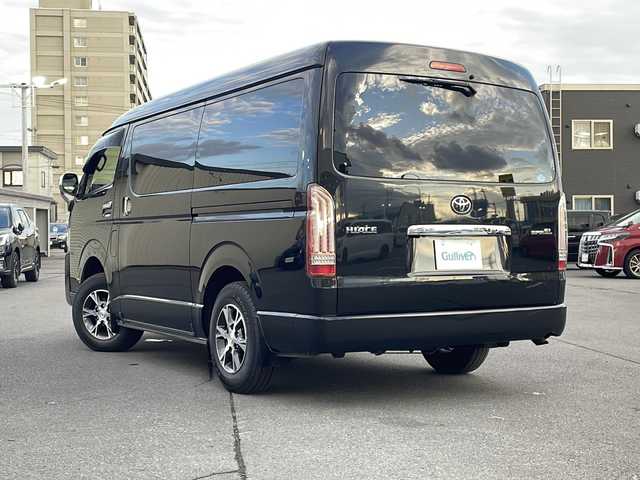 トヨタ ハイエース GL 道北・旭川 2018(平30)年 7.1万km ブラックマイカ ・4WD/・禁煙車/・寒冷地仕様/・社外LEDテール/・純正SDナビ/ CD/DVD/SD/MSV/BT/フルセグ/・バックカメラ/・純正12型フリップダウンモニター/・左側パワースライドドア /・トヨタセーフティセンスP/・PCS/・LDA/・オートハイビーム/・オートライト/・LEDヘッドライト/・フォグライト /・リアフォグ/・プッシュスタート/・AC100V/・ビルトインETC/・純正フロアマット/・ドアバイザー/・純正テール積込