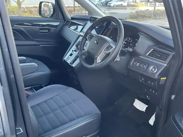 三菱 デリカＤ：５ シャモニー 福島県 2025(令7)年 0.1千km グラファイトグレーメタリック/ブラックマイカ 登録済未使用車/4WD/e-アシスト/・衝突被害軽減ブレーキシステム/・車線逸脱警報システム/・レーダークルーズコントロール/・オートマチックハイビーム/・誤発信抑制機能/純正メモリナビゲーション/【CD/DVD/Bluetooth/HDMI/フルセグTV】/型番：EX11NX/マルチアラウンドモニター/両側パワースライドドア/パワーバックドア/ハーフレザーシート/・運転席パワーシート/スマートキー/・プッシュスタート/・スペアキー/LEDヘッドライト/・オートライト/・オートハイビーム/・フォグランプ/本革巻きステアリング/・パドルシフト/・ステアリングリモコン/・ステアリングヒーター/取扱説明書/新車時保証書