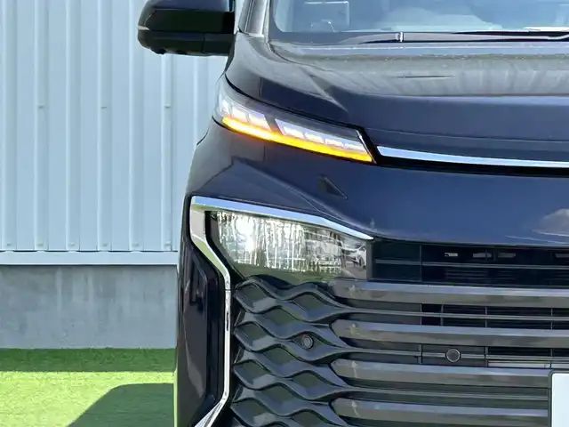 トヨタ ヴォクシー S－Z 香川県 2022(令4)年 2.4万km スパークリングブラックパールクリスタルシャイン 登録時走行距離：23196km/メーカー純正ナビ/　CD DVD BT フルセグTV/全方位カメラ/モデリスタフルエアロ/両側パワースライドドア/パワーバックドア/プリクラッシュセーフティシステム/レーンキープアシスト/レーダークルーズコントロール/ブラインドスポットモニター/クリアランスソナー/パーキングアシスト/オートハイビーム/LEDヘッドライト/オートライト/レベライザヘッドライト/MTモード付AT/電子パーキングブレーキ/横滑り防止装置/前後ドライブレコーダー/ビルトインETC/ハーフレザーシート/シートヒーター/革巻きステアリング/ステアリングスイッチ/プッシュスタート/スマートキー