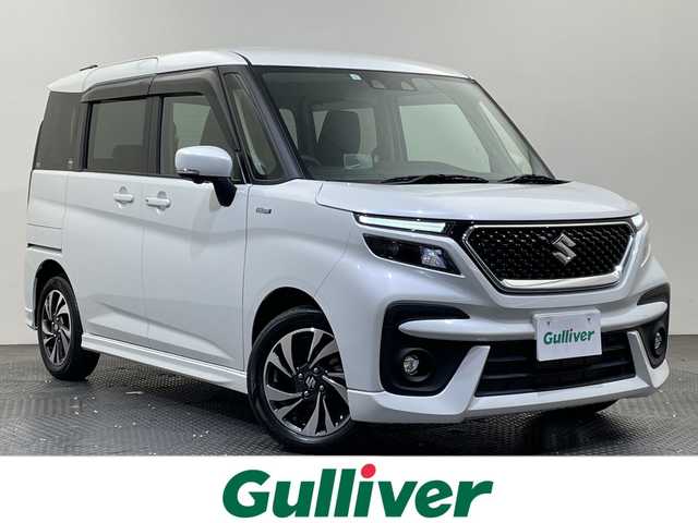 スズキ ソリオ バンディット HV MV 愛媛県 2023(令5)年 3.8万km ピュアホワイトP 純正ナビ/フルセグテレビ/Bluetooth/USB/全周囲カメラ/片側電動スライドドア/衝突被害軽減ブレーキ/レーダークルーズコントロール/コーナーセンサー/シートヒーター/ヘッドアップディスプレイ/ETC/オートライト/LEDヘッドライト/スマートキー/保証書/取扱説明書