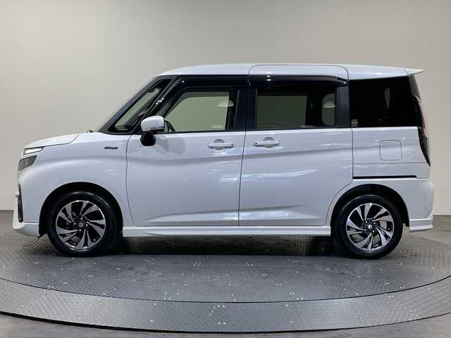 スズキ ソリオ バンディット HV MV 愛媛県 2023(令5)年 3.8万km ピュアホワイトP 純正ナビ/フルセグテレビ/Bluetooth/USB/全周囲カメラ/片側電動スライドドア/衝突被害軽減ブレーキ/レーダークルーズコントロール/コーナーセンサー/シートヒーター/ヘッドアップディスプレイ/ETC/オートライト/LEDヘッドライト/スマートキー/保証書/取扱説明書