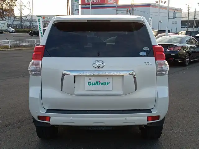 トヨタ ランドクルーザー プラド TX Lパッケージ 福井県 2011(平23)年 9.7万km ホワイトパールクリスタルシャイン 4WD/社外HDDナビ（CN-HW860D）/・（ワンセグTV/CD/DVD/Bluetooth）/バックカメラ/電動格納サードシート/クルーズコントロール/前後コーナーセンサー/前席シートヒーター/前席パワーシート/ETC/エンジンスタートボタン/純正フロアマット/オートライト/スマートキー