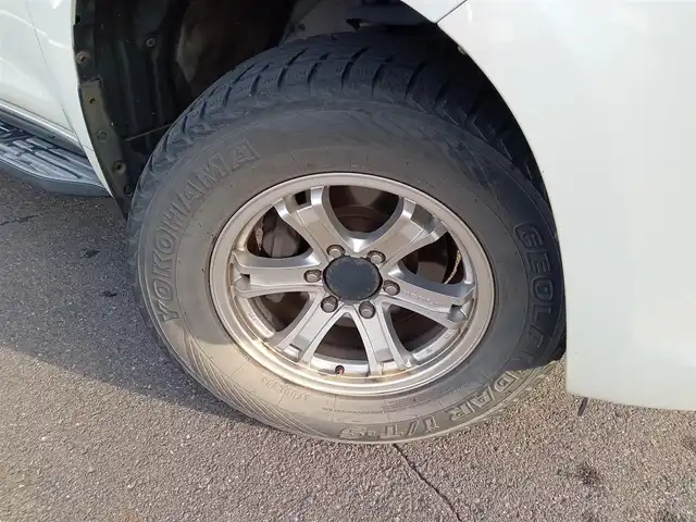 トヨタ ランドクルーザー プラド TX Lパッケージ 福井県 2011(平23)年 9.7万km ホワイトパールクリスタルシャイン 4WD/社外HDDナビ（CN-HW860D）/・（ワンセグTV/CD/DVD/Bluetooth）/バックカメラ/電動格納サードシート/クルーズコントロール/前後コーナーセンサー/前席シートヒーター/前席パワーシート/ETC/エンジンスタートボタン/純正フロアマット/オートライト/スマートキー