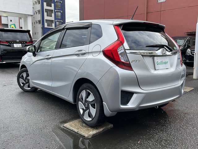 ホンダ フィット ハイブリット Lパッケージ 宮崎県 2015(平27)年 9.1万km アラバスターシルバーメタリック 純正メモリーナビ/ワンセグテレビ/バックカメラ/クルーズコントロール/プッシュスタート/ETC/CDチェンジャー/パワーウインドウ/パワーステアリング/スマートキー/純正フロアマット/純正アルミホイール