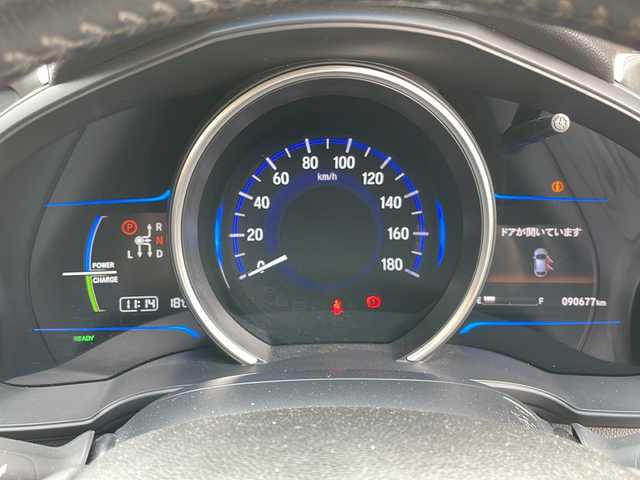 ホンダ フィット ハイブリット Lパッケージ 宮崎県 2015(平27)年 9.1万km アラバスターシルバーメタリック 純正メモリーナビ/ワンセグテレビ/バックカメラ/クルーズコントロール/プッシュスタート/ETC/CDチェンジャー/パワーウインドウ/パワーステアリング/スマートキー/純正フロアマット/純正アルミホイール