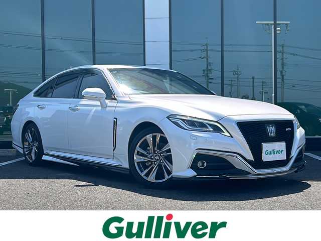 トヨタ クラウン ハイブリッド RS アドバンス 福岡県 2021(令3)年 8.6万km プレシャスホワイトパール ワンオーナー/モデリスタエアロ(フロント、サイド、リヤ)/12.3インチ純正ナビ/　(AM/FM/CD/DVD/Bluetooth/Miracast/フルセグTV)/バックカメラ/レーダー探知機・スーパーキャット【LS710】/前後ドライブレコーダー・コムテック【DC-DR652】/トヨタセーフティセンス/・プリクラッシュセーフティ/・レーントレーシングアシスト/・アダプティブハイビーム/・オートマッチックハイビーム/・ロードサインアシスト/・レーダークルーズコントロール/・先行車発進告知/ブラインドスポットモニター/クリアランスソナー/リヤクロストラフィックアラート/パーキングサポートブレーキ/ヘッドアップディスプレイ/ドライブモードセレクトスイッチ/ブレーキホールド/パドルシフト/黒色レザーシート/D席シートメモリー/D/N席パワーシート/D/N席シートヒーター・シートベンチレーション/ステアリングヒーター/純正18インチアルミホイール/純正フロアマット/後席USBポート/スペアキー×1、カードキー×1/保証書/取扱説明書/ナビ取扱説明書