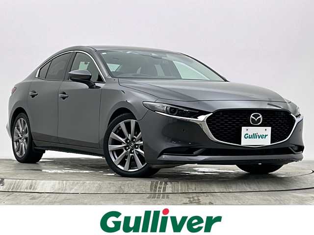 マツダ マツダ３セダン 20S Lパッケージ 宮城県 2020(令2)年 2.9万km マシーングレープレミアムM 純正ナビ/(BT/CD/USB/TV)/全方位カメラ/ビルトインETC/前方ドライブレコーダー/レザーシート/シートヒーター/レーダークルーズコントロール/パドルシフト/HUD/プッシュスタート/スマートキー/スペアキー/オートライト/LEDヘッドライト/純正18インチアルミホイール/社外フロアマット