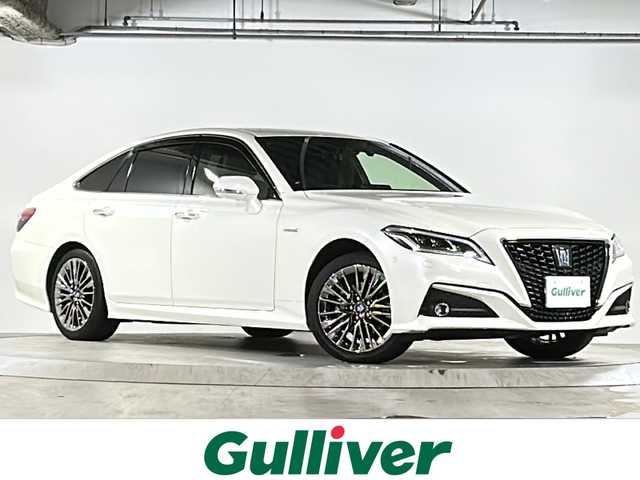 トヨタ クラウン ハイブリッド G－エグゼクティブ Four 広島県 2019(平31)年 7万km ホワイトパールクリスタルシャイン 禁煙/純正ナビ/CD/DVD/DTV/Bluetooth/パノラミックビューモニター/レーダークルーズコントロール/LEDオートライト/オートマチックハイビーム/社外AW付スタッドレス積み込み/ビルトインETC2.0/ドライブレコーダー/レザーシート/シートヒーター/シートベンチレーション/パワーシート/メモリーシート/ステアリングスイッチ/ステアリングヒーター/ワイヤレス充電/スマートキー/スペアキー/カードキー