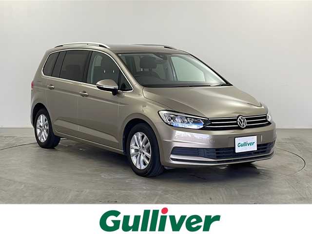 フォルクスワーゲン ゴルフ トゥーラン TSI コンフォートライン 栃木県 2019(令1)年 2.7万km ベージュ 純正ナビ/（BT/AppleCarPlay/Android Auto/AM/FM）/MTモード付AT/横滑り防止/レーダークルーズコントロール/ビルトインETC2.0/ドライブレコーダー/電動格納ミラー/純正アルミホイール/純正フロアマット/スマートキー/スペアキー