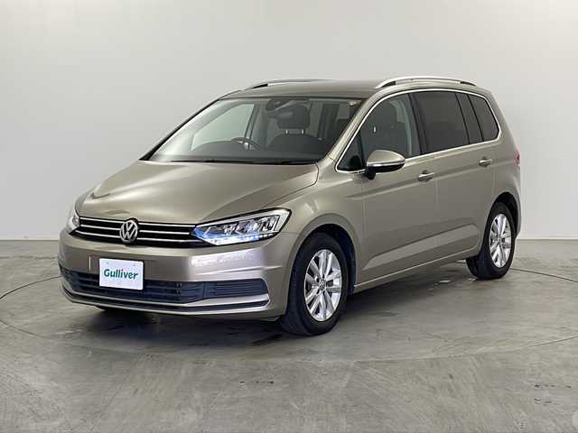 フォルクスワーゲン ゴルフ トゥーラン TSI コンフォートライン 栃木県 2019(令1)年 2.7万km ベージュ 純正ナビ/（BT/AppleCarPlay/Android Auto/AM/FM）/MTモード付AT/横滑り防止/レーダークルーズコントロール/ビルトインETC2.0/ドライブレコーダー/電動格納ミラー/純正アルミホイール/純正フロアマット/スマートキー/スペアキー