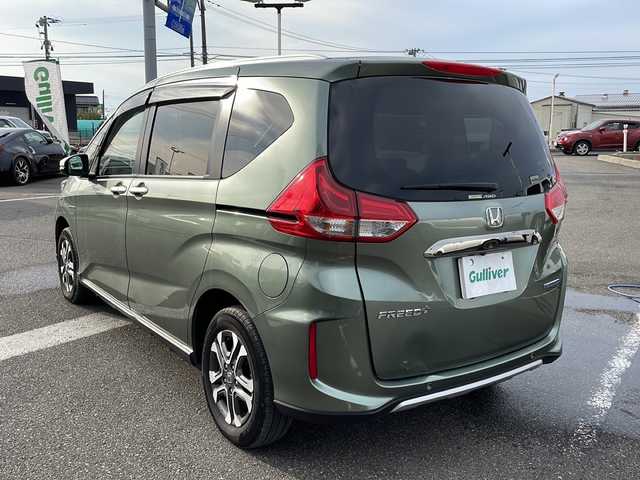 ホンダ フリード＋ ハイブリット クロスター ホンダセンシング 新潟県 2020(令2)年 3.3万km シルバーミストグリーンM ホンダセンシング/・衝突軽減ブレーキ（CMBS）/・車線維持支援システム（LKAS）/・アダプティブクルーズコントロール（ACC）/・後方誤発進抑制機能/・誤発進抑制機能/両側パワースライドドア/純正SDナビ/地デジTV/【DVD/CD再生機能　Bluetooth接続】/バックカメラ/ドライブレコーダー/革巻きステアリング/ステアリングスイッチ/ハーフレザーシート/前席シートヒーター/ETC/LEDヘッドライト/フォグライト/ウインカーミラー/リアコーナーセンサー/純正15インチアルミホイル/サイド/カーテンエアバッグ/Honda スマートキー