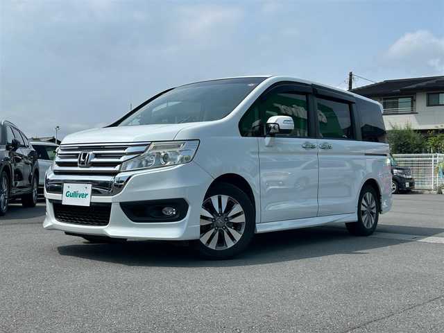 ホンダ ステップワゴン スパーダ Z 静岡県 2014(平26)年 11.3万km ホワイトオーキッドパール 純正ナビ/両側パワスラ/バックカメラ/クルーズコントロール/純正アルミホイール/ビルトインＥＴＣ/パワーステアリング/パワーウィンドウ/ＭＴモード付きＡＴ/アイドリングストッップ/Ｂｌｕｅｔｏｏｔｈ接続/ＡＢＳ/ウォークスルー/チップアップシート/横滑り防止装置/オートライト