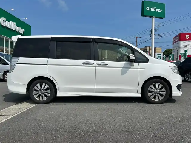 ホンダ ステップワゴン スパーダ Z 静岡県 2014(平26)年 11.3万km ホワイトオーキッドパール 純正ナビ/両側パワスラ/バックカメラ/クルーズコントロール/純正アルミホイール/ビルトインＥＴＣ/パワーステアリング/パワーウィンドウ/ＭＴモード付きＡＴ/アイドリングストッップ/Ｂｌｕｅｔｏｏｔｈ接続/ＡＢＳ/ウォークスルー/チップアップシート/横滑り防止装置/オートライト