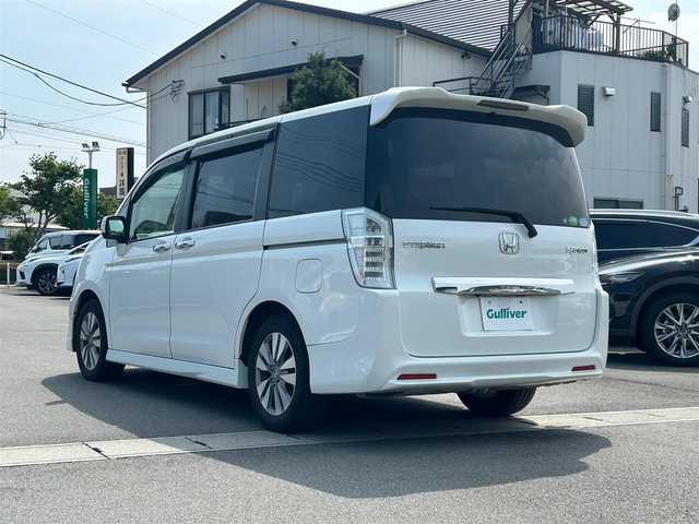 ホンダ ステップワゴン スパーダ Z 静岡県 2014(平26)年 11.3万km ホワイトオーキッドパール 純正ナビ/両側パワスラ/バックカメラ/クルーズコントロール/純正アルミホイール/ビルトインＥＴＣ/パワーステアリング/パワーウィンドウ/ＭＴモード付きＡＴ/アイドリングストッップ/Ｂｌｕｅｔｏｏｔｈ接続/ＡＢＳ/ウォークスルー/チップアップシート/横滑り防止装置/オートライト
