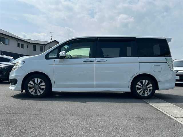 ホンダ ステップワゴン スパーダ Z 静岡県 2014(平26)年 11.3万km ホワイトオーキッドパール 純正ナビ/両側パワスラ/バックカメラ/クルーズコントロール/純正アルミホイール/ビルトインＥＴＣ/パワーステアリング/パワーウィンドウ/ＭＴモード付きＡＴ/アイドリングストッップ/Ｂｌｕｅｔｏｏｔｈ接続/ＡＢＳ/ウォークスルー/チップアップシート/横滑り防止装置/オートライト