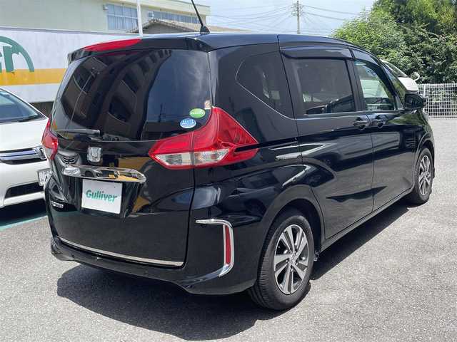 ホンダ フリード G ホンダセンシング 静岡県 2020(令2)年 4.1万km クリスタルブラックパール ワンオーナー/純正ナビ/フルセグTV/DVD/CD/BT/SD/MSV/バックカメラ/両側パワースライドドア/ハーフレザーシート/衝突軽減ブレーキ/レーンキープアシスト/レーダークルーズコントロール/純正前方ドライブレコーダー/ビルトインETC/LEDヘッドライト/LEDフォグ/ステアリングスイッチ/純正15インチAW/スマートキー×2/保証書/取扱説明書/ナビ取扱説明書