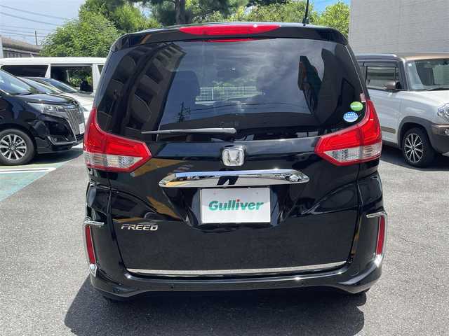 ホンダ フリード G ホンダセンシング 静岡県 2020(令2)年 4.1万km クリスタルブラックパール ワンオーナー/純正ナビ/フルセグTV/DVD/CD/BT/SD/MSV/バックカメラ/両側パワースライドドア/ハーフレザーシート/衝突軽減ブレーキ/レーンキープアシスト/レーダークルーズコントロール/純正前方ドライブレコーダー/ビルトインETC/LEDヘッドライト/LEDフォグ/ステアリングスイッチ/純正15インチAW/スマートキー×2/保証書/取扱説明書/ナビ取扱説明書