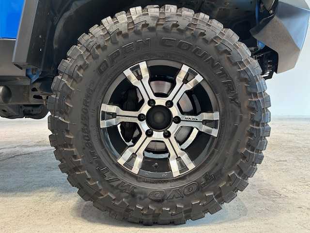 トヨタ ＦＪクルーザー オフロードパッケージ 宮城県 2011(平23)年 13.8万km ブルー/ホワイト 4WD/社外フルセグTV/社外HDDナビ/CD/DVD/社外ETC/車外カメラ/リアフォグランプ/リアデフロック/JAOSエアロ/BILSTEIN/Clazzio/クラリオンスピーカー/クリアランスソナー/ブレーキアシスト/補助灯/ルーフラック/牽引キャッチ/背面タイヤ/社外16インチアルミホイール（MKW)