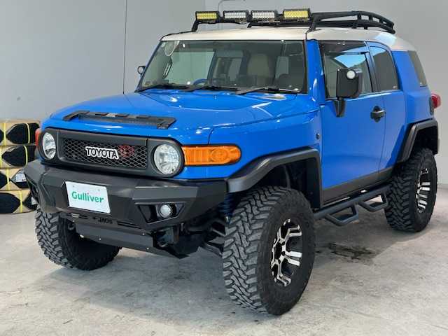 トヨタ ＦＪクルーザー オフロードパッケージ 宮城県 2011(平23)年 13.8万km ブルー/ホワイト 4WD/社外フルセグTV/社外HDDナビ/CD/DVD/社外ETC/車外カメラ/リアフォグランプ/リアデフロック/JAOSエアロ/BILSTEIN/Clazzio/クラリオンスピーカー/クリアランスソナー/ブレーキアシスト/補助灯/ルーフラック/牽引キャッチ/背面タイヤ/社外16インチアルミホイール（MKW)