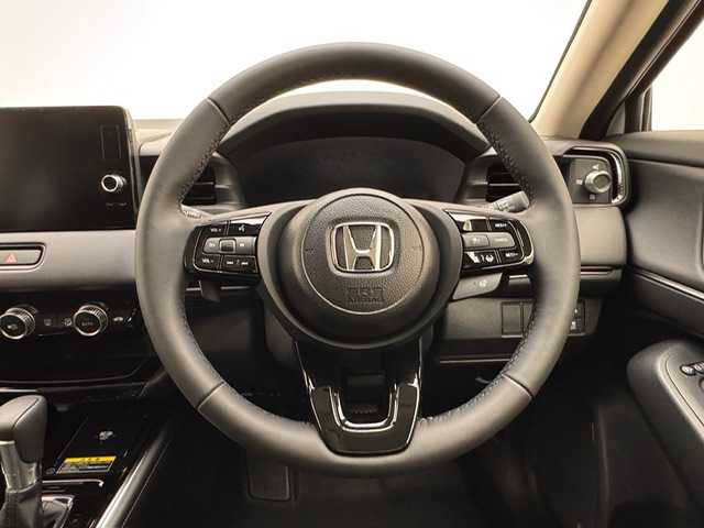 ホンダ ヴェゼル ハイブリッド e:HEV Z 兵庫県 2025(令7)年 0.1千km プラチナホワイトパール e:HEV Z　3VC4AG3　Honda CONNECTディスプレー+ETC2.0車載器+ワイヤレス充電器(220/000)/純正メモリーナビ（フルセグ・BT・カープレイ）/バックカメラ/追従式クルーズコントロール/パワーバックドア/純正18インチAW/置くだけ充電/パドルシフト/ハーフレザーシート/シートヒーター（D/N席）/前後コーナーセンサー/オートライト/オートハイビーム/BSM/レーンキープ/ダウンヒルアシスト
