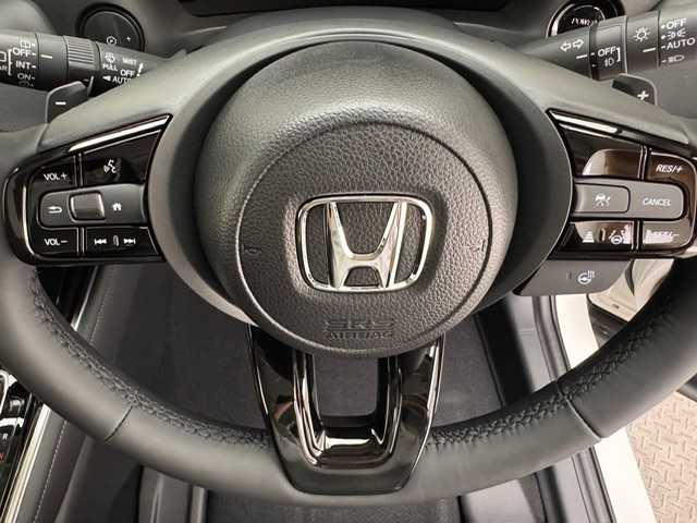 ホンダ ヴェゼル ハイブリッド e:HEV Z 兵庫県 2025(令7)年 0.1千km プラチナホワイトパール e:HEV Z　3VC4AG3　Honda CONNECTディスプレー+ETC2.0車載器+ワイヤレス充電器(220/000)/純正メモリーナビ（フルセグ・BT・カープレイ）/バックカメラ/追従式クルーズコントロール/パワーバックドア/純正18インチAW/置くだけ充電/パドルシフト/ハーフレザーシート/シートヒーター（D/N席）/前後コーナーセンサー/オートライト/オートハイビーム/BSM/レーンキープ/ダウンヒルアシスト