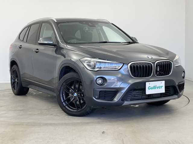 ＢＭＷ Ｘ１ xDrive 18d xライン 新潟県 2019(令1)年 6.7万km グレー 純正メモリナビ　/バックカメラ　/ターボ　/追従クルーズコントロール/レーンキープアシスト　/前後コーナーセンサー　/LEDオートライト　/４WD　/パーキングアシスト　/ダウンヒルアシストコントロール　/純正１８インチアルミホイール/MTモード付AT/スマートキー　