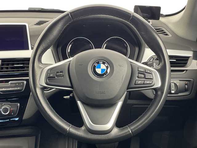 ＢＭＷ Ｘ１ xDrive 18d xライン 新潟県 2019(令1)年 6.7万km グレー 純正メモリナビ　/バックカメラ　/ターボ　/追従クルーズコントロール/レーンキープアシスト　/前後コーナーセンサー　/LEDオートライト　/４WD　/パーキングアシスト　/ダウンヒルアシストコントロール　/純正１８インチアルミホイール/MTモード付AT/スマートキー　