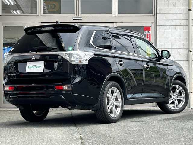 三菱 アウトランダー 24G ナビパッケージ 岩手県 2014(平26)年 6.3万km アメジストブラック 純正ナビ　/バックカメラ　/フルセグＴＶ　/電動リアゲート　/ビルトインＥＴＣ　/レーダークルーズコントロール/革調シートカバー　/革ステアリング /ナビステアリングスイッチ/パドルシフト　/ＥＣＯモード　/オートライト　/フォグランプ　/スマートキー/プッシュスタート/ドアバイザー/フロアマット/保証書　取説　ナビ取説