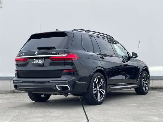 ＢＭＷ Ｘ７ xDrive35d Mスポーツ 東京都 2021(令3)年 5万km サファイアブラックP iDriveナビ/12セグ/イノベーションパッケージ/HUD/ディスプレイキー/ジェスチャーコントロール/360°カメラ/メリノブラックレザーシート/ACC/LEDオートハイビーム /ウェルネスパッケージ/スカイラウンジパノラマサンルーフ/純正21inchAW/インテリジェントセーフティパッケージ/ACC/LCW/ステアアシスト/エアサス/HDC/パドルシフト/アルカンターラルーフライニング/Harman Kardonプレミアムサウンド/ソフトクローズドドア/クリスタルシフトノブ/ワイヤレスチャージ/ブルーキャリパー