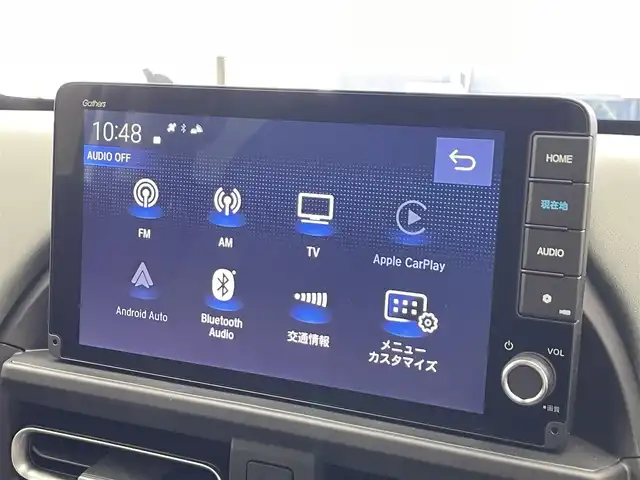 ホンダ フリード ハイブリット e:HEV クロスター 滋賀県 2025(令7)年 0.1千km プラチナホワイトパール 登録済未使用車/純正9インチナビ/【Bluetooth/フルセグTV/Apple CarPlay/Android Auto】/ホンダセンシング/・衝突軽減ブレーキ（CMBS）/・先行車発進お知らせ機能/・歩行者事故低減ステアリング/・路外逸脱抑制機能/・標識認識機能/・渋滞追従機能付アダプティブクルーズコントロール/・車線維持支援システム（LKAS）/・トラフィックジャムアシスト（渋滞運転支援機能）/・ブラインドスポットインフォメーション/・誤発進抑制機能/・後方誤発進抑制機能/・近距離衝突軽減ブレーキ/・急アクセル抑制機能/・パーキングセンサーシステム/・後退出庫サポート/・オートハイビーム/・アダプティブドライビングビーム/両側パワースライドドア/電動パーキングブレーキ/オートブレーキホールド/プッシュスタート/スマートキー/ステアリングリモコン